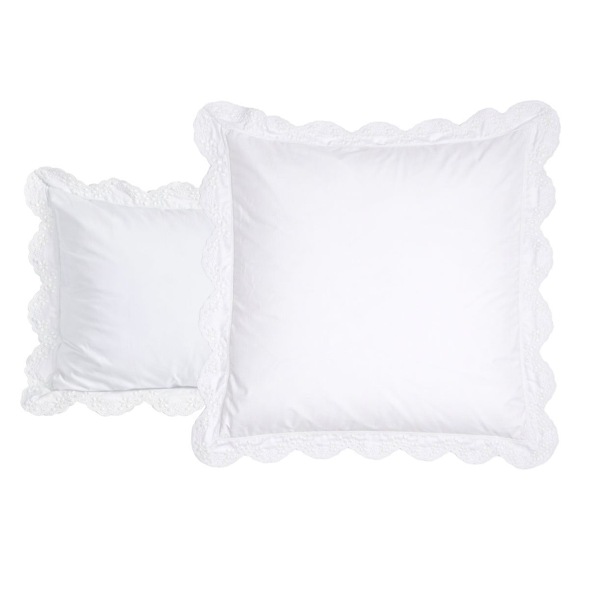 détoures sur fond blanc des taies d'oreiller de la collection heloise percale blanche brodée